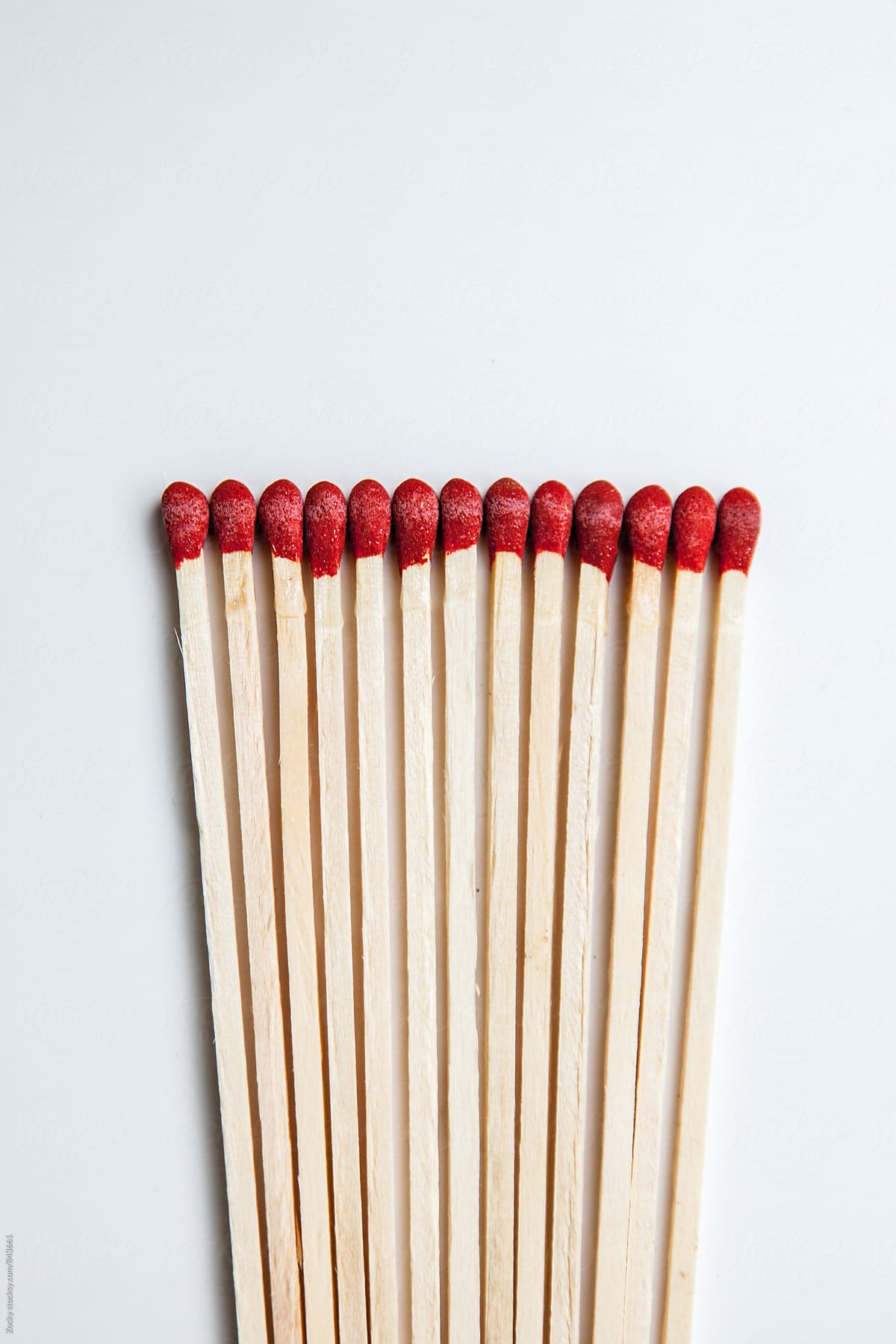Matches in a row on white background