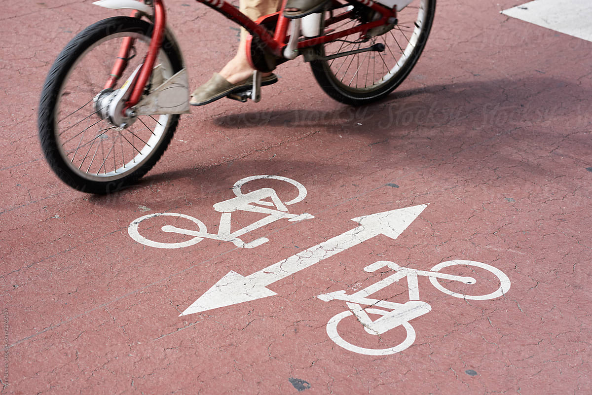 Cycle sign on red asphalt