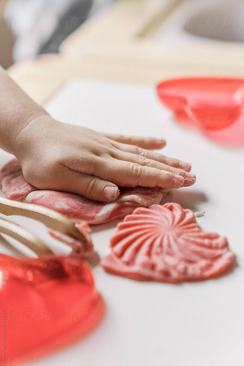 valentines day play dough heart making and pressing -vertical