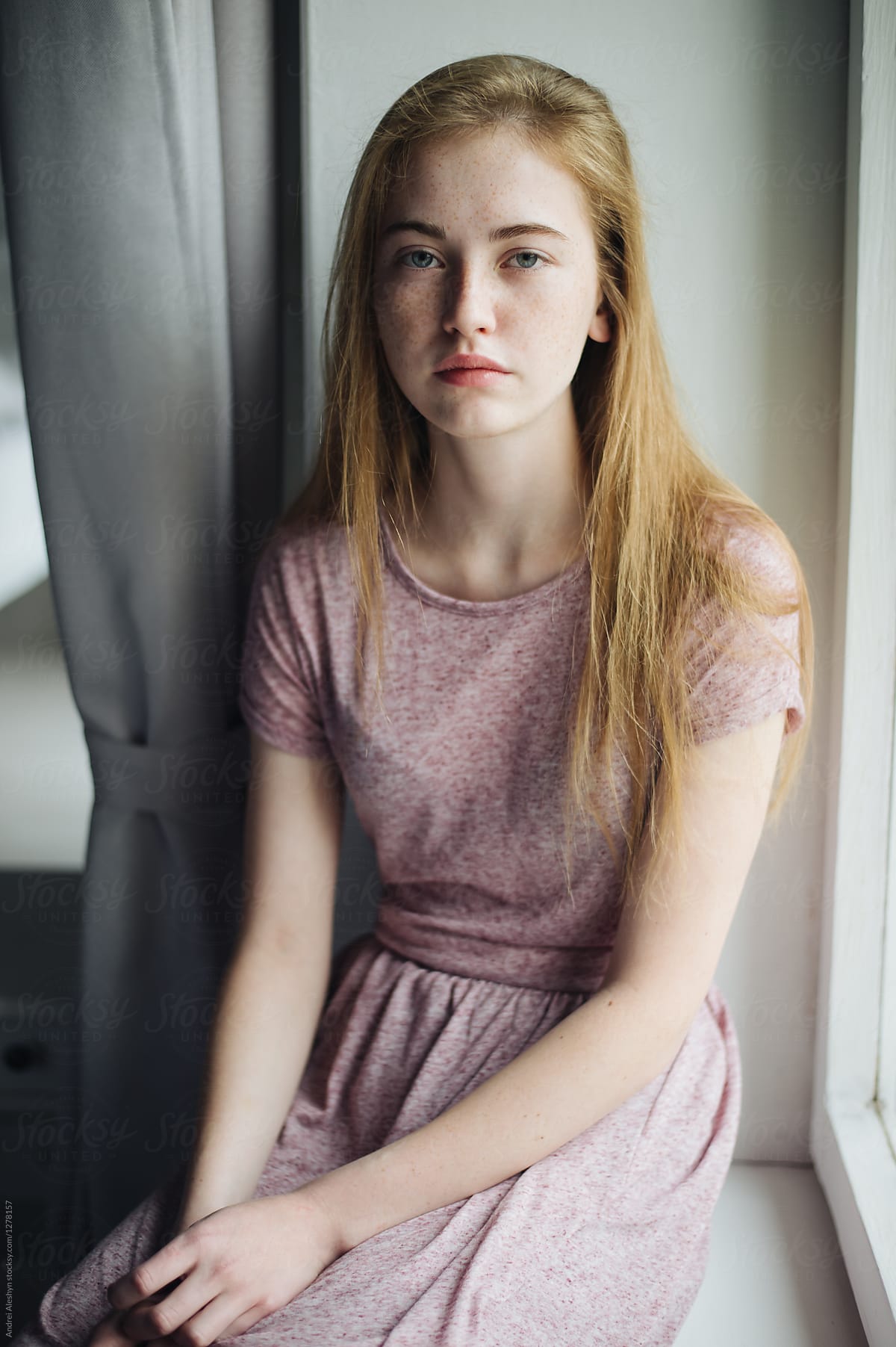 Portrait Of A Beautiful Girl With Freckles By Stocksy Contributor Andrei Aleshyn Stocksy