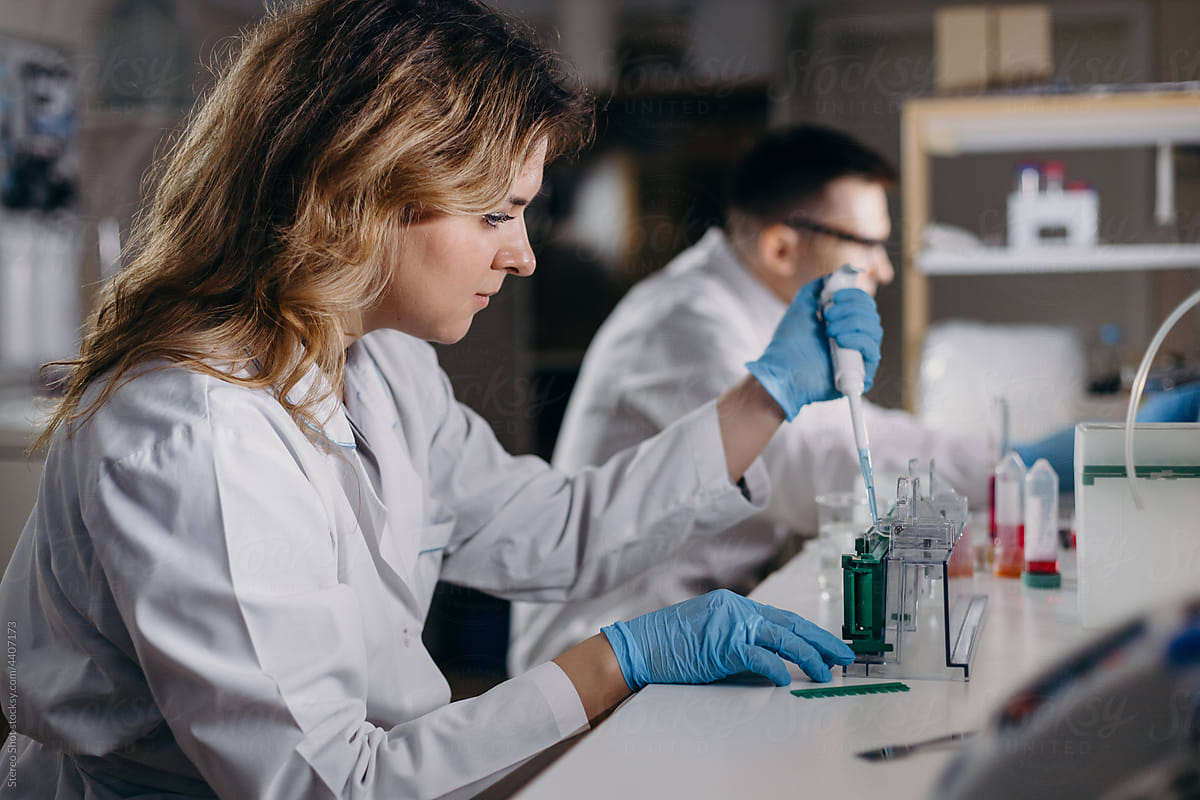 Female biologist working with samples in laboratory