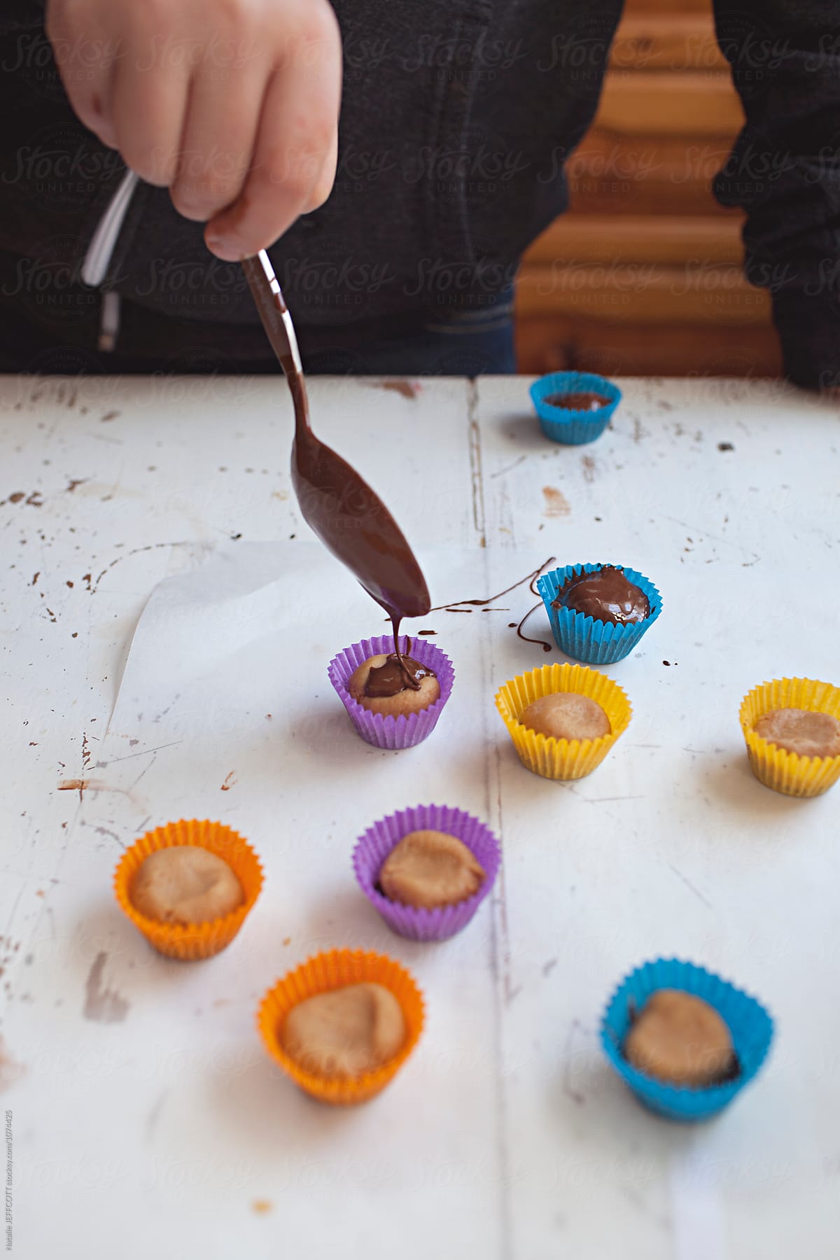 Making peanut butter cups with a child