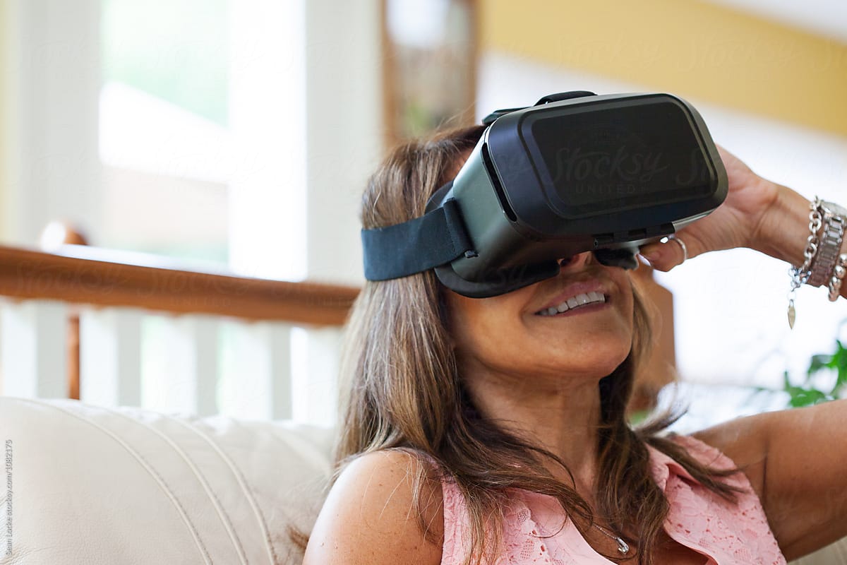 VR: Woman Enjoying Fun Of Virtual Reality Headset