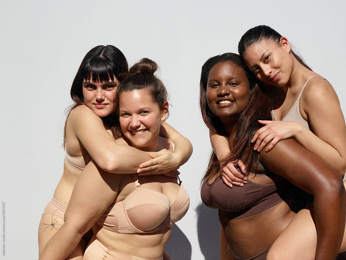 Group Of Female Friends In Their Underwear by Stocksy Contributor  Ohlamour Studio - Stocksy