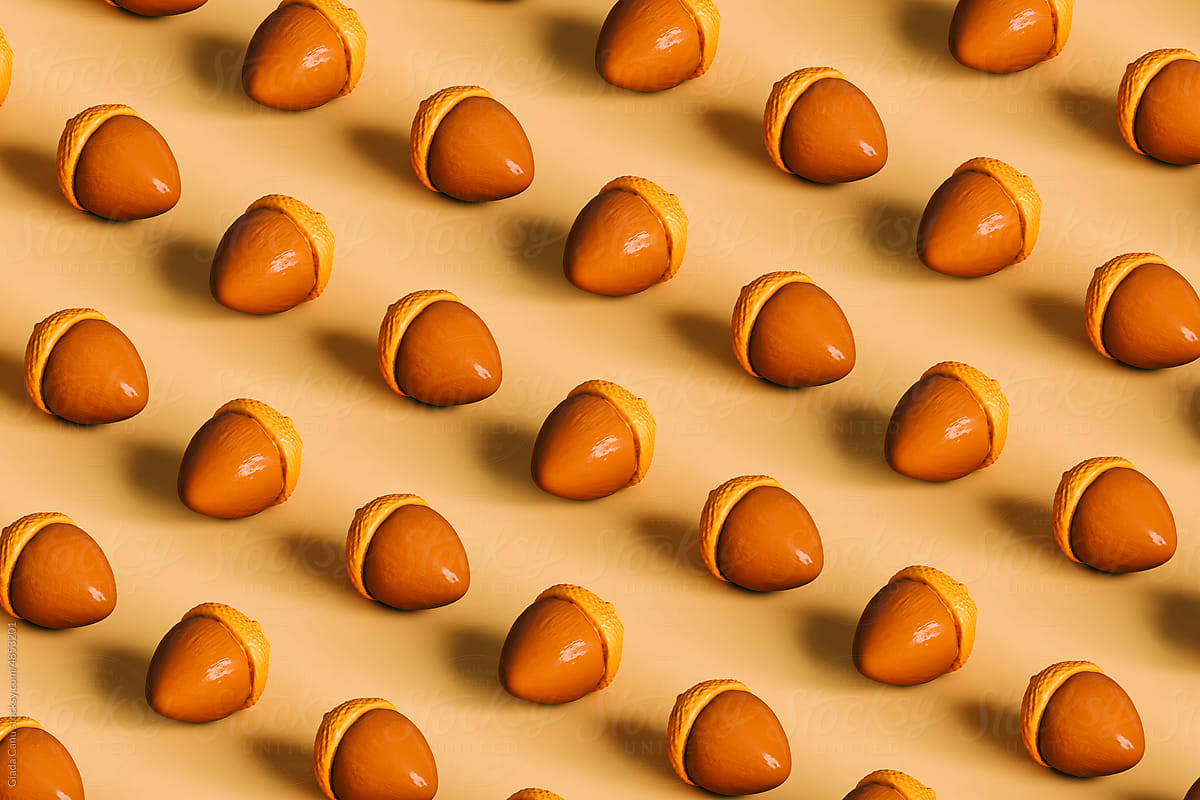 many acorns on yellow background