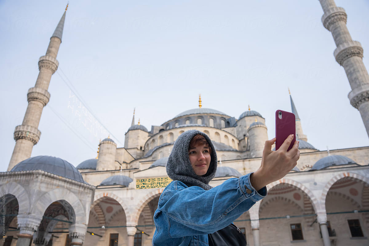 Woman Visiting The Blue Mosque, Istanbul.