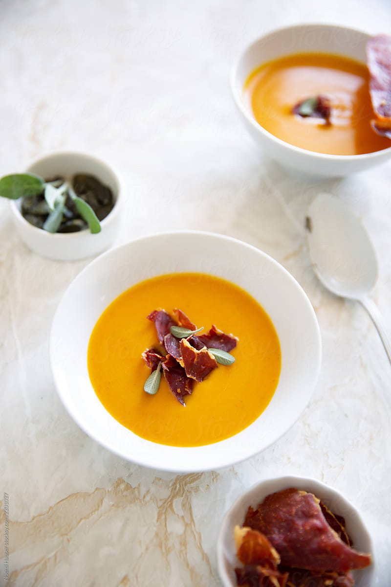 Roasted pumpkin soup with ham chips