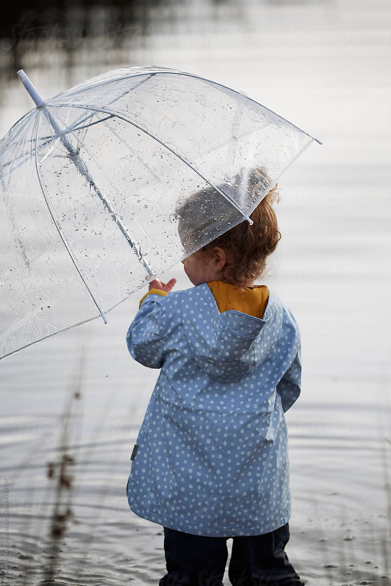 Little girl and umbrella