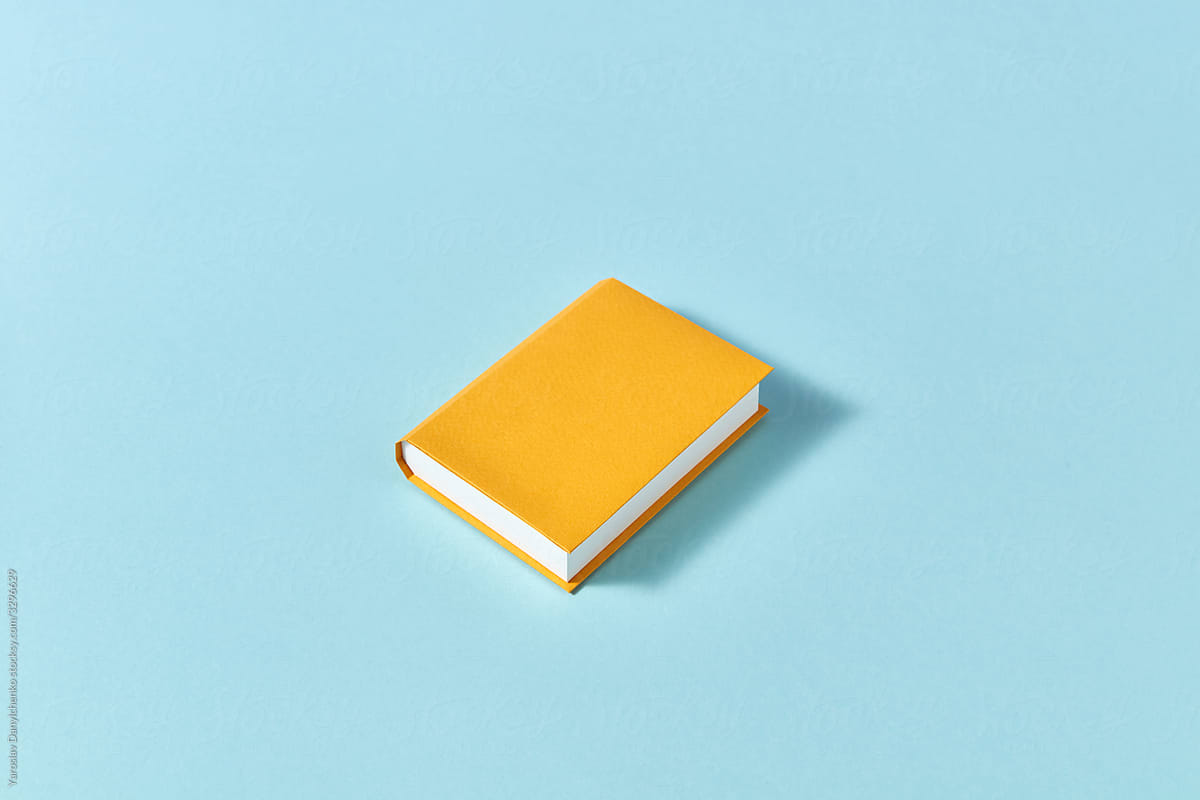One yellow papercraft book made from paper.