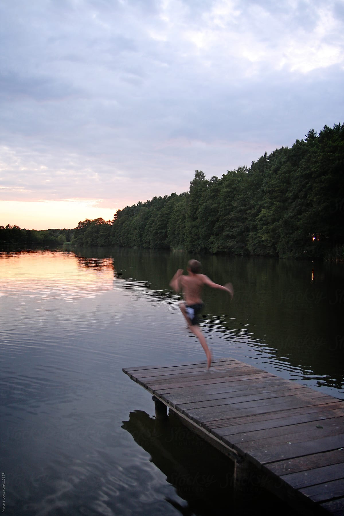 Jump in the lake at sunset