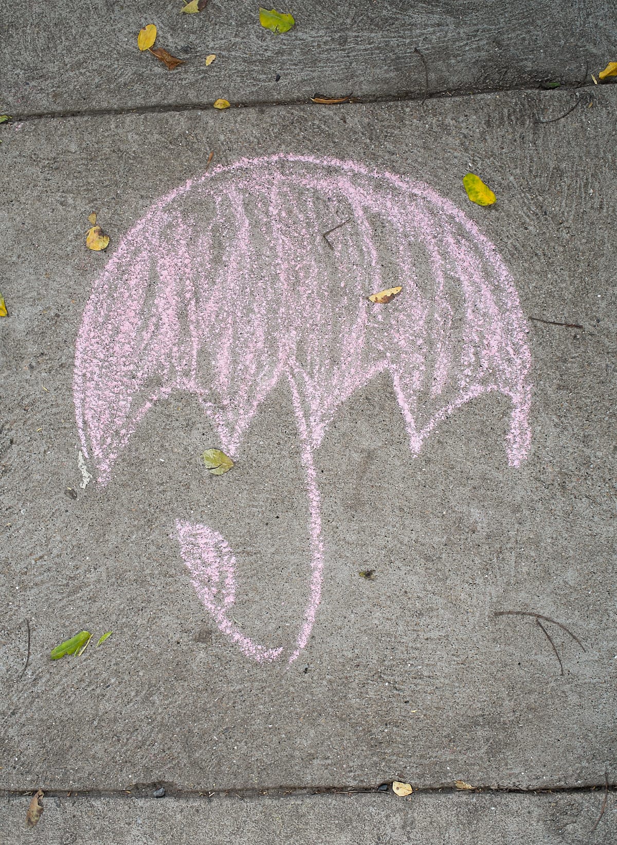 Drawing of a pink umbrella on a city sidewalk.