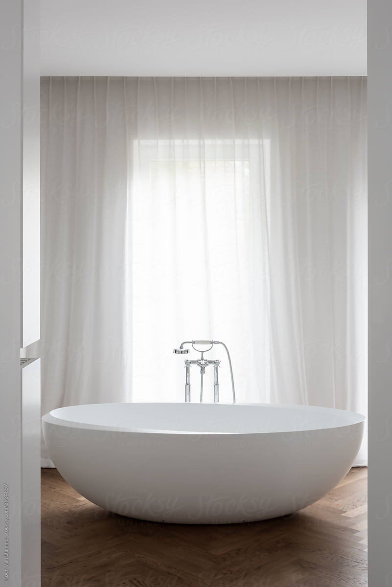 bathtub and faucet