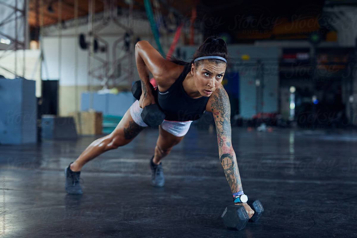 Sportswoman Exercising In The Gym Del Colaborador De Stocksy Branko Starcevic Stocksy