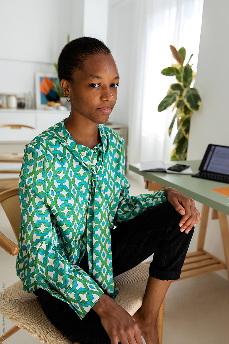 Stylish African woman portrait at home office
