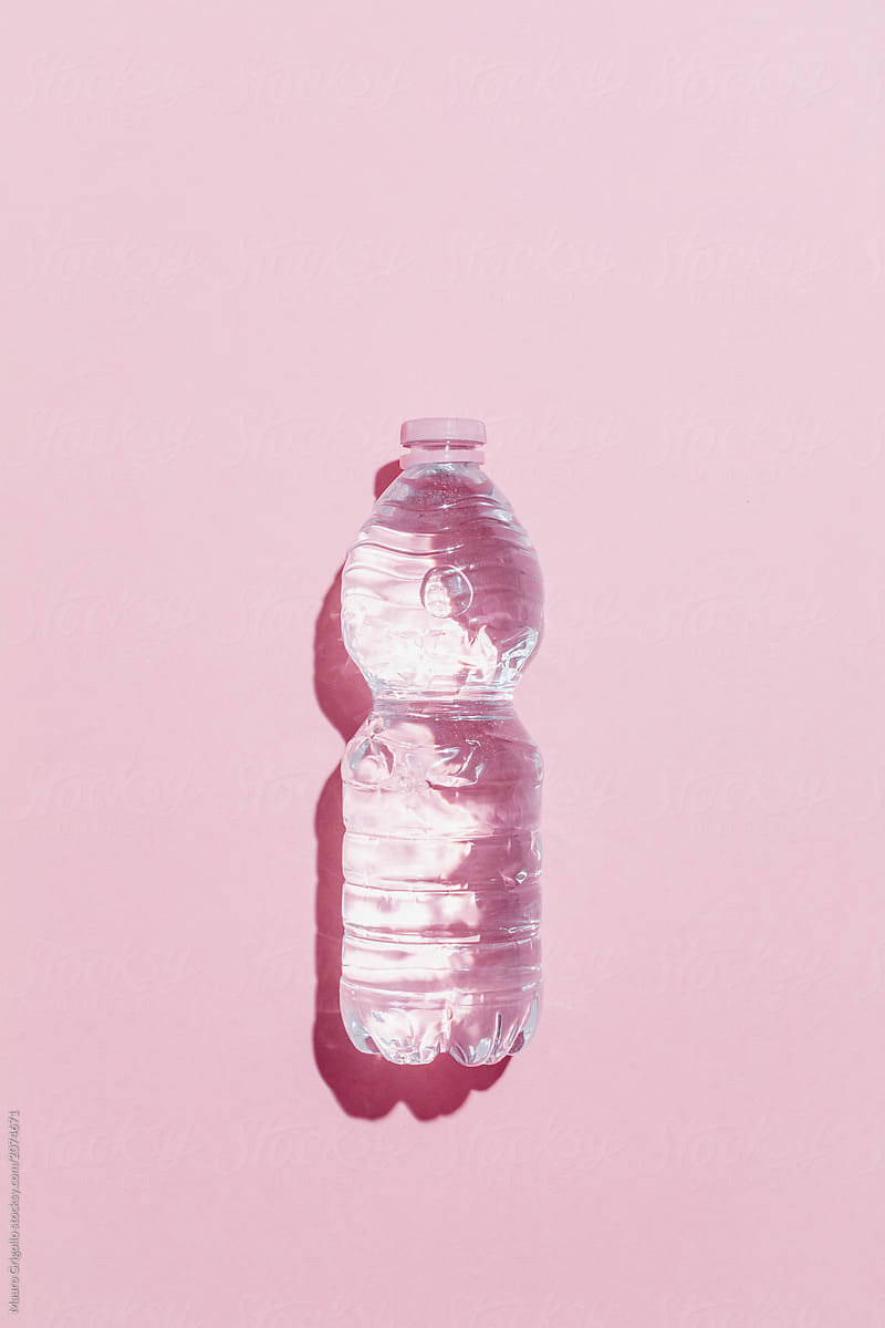 Plastic bottle on pink background. Recycle.