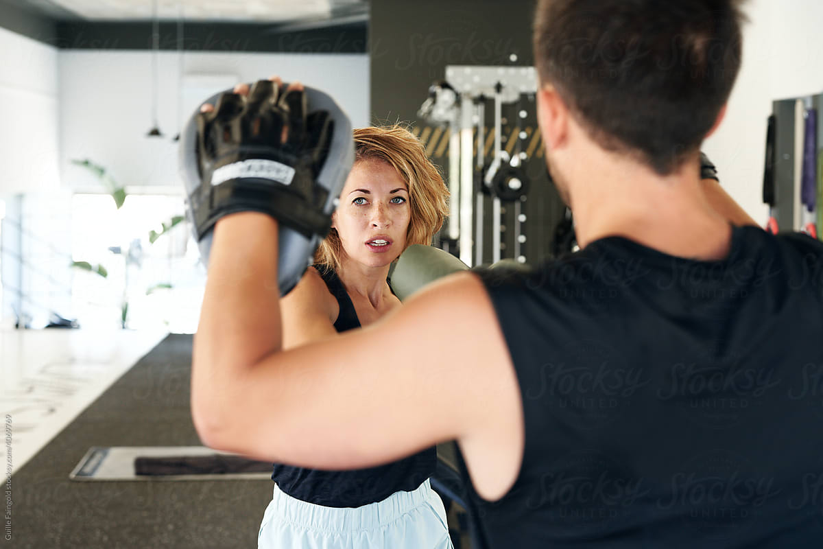 sportswoman exercising punch