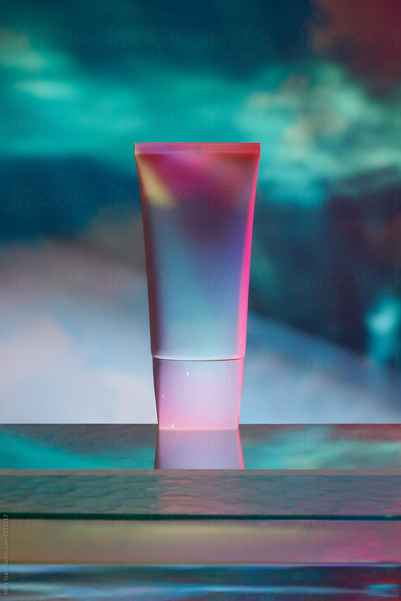 Cosmetic bottle on glass podium