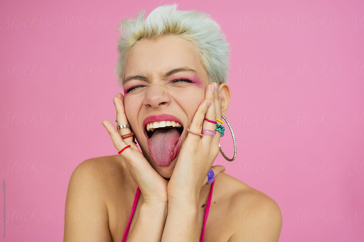 Crazy Woman Showing Tongue By Stocksy Contributor Roman Shalenkin Stocksy