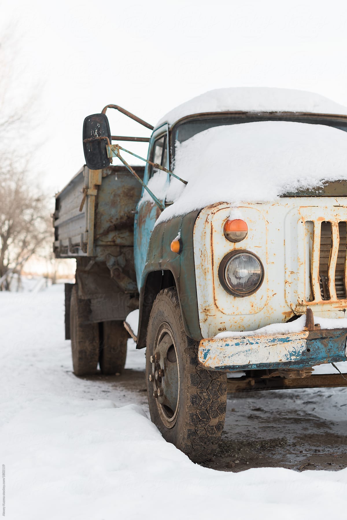 Vintage russian truck  covered with snow