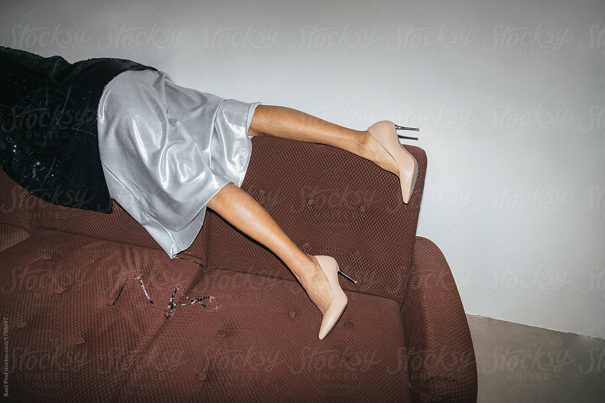 Legs on Couch with Silver Dress and Beige Heels