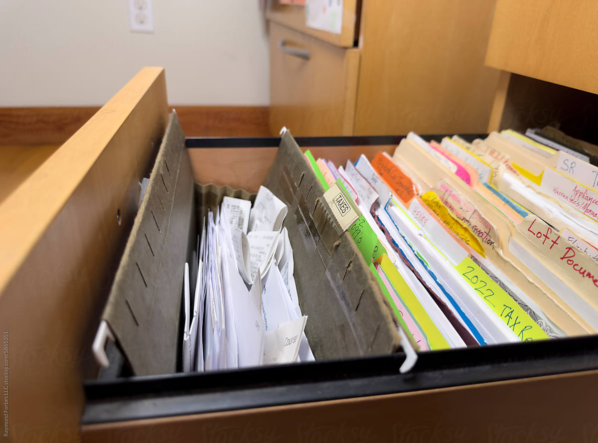 Tax Receipts in in file folder in file cabinet drawer  in home office