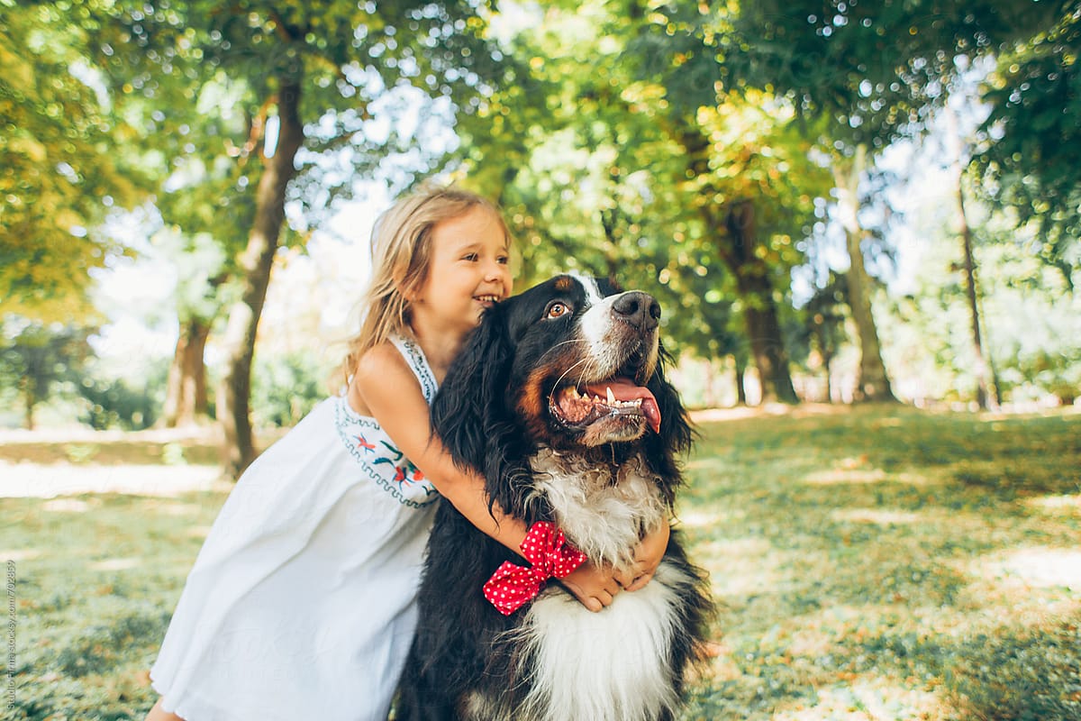 Small Blonde Girl With Huge Dog.