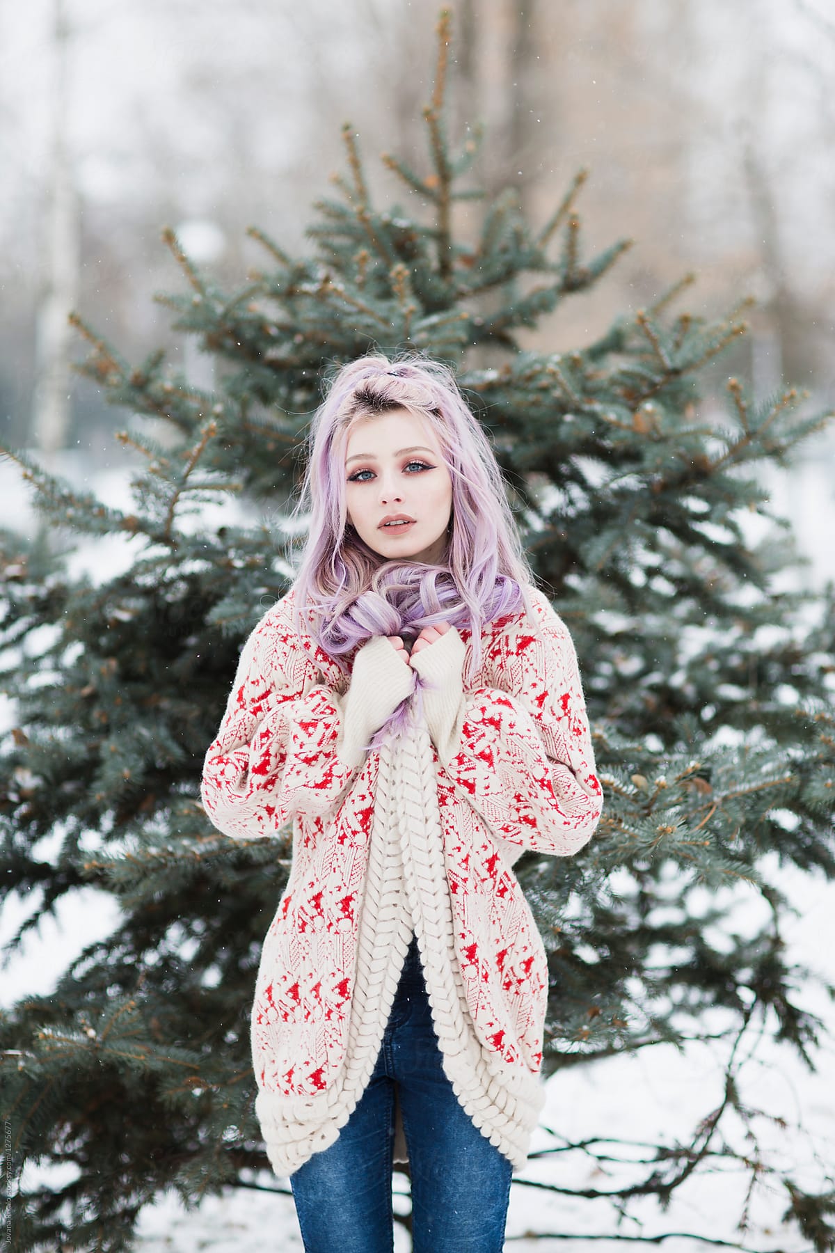 Portrait Of A Beautiful Young Woman With Pink Hair On Snow Del Colaborador De Stocksy Jovana