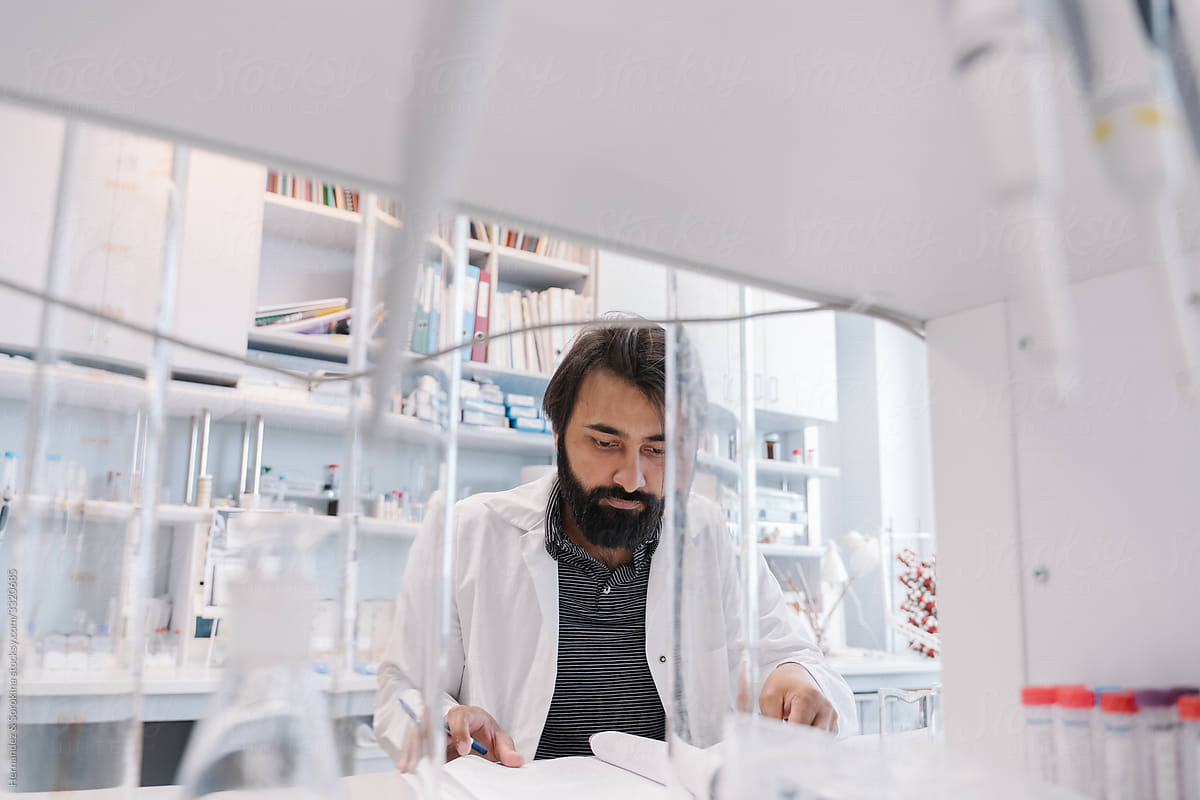 Researcher Analysing Data In A Lab