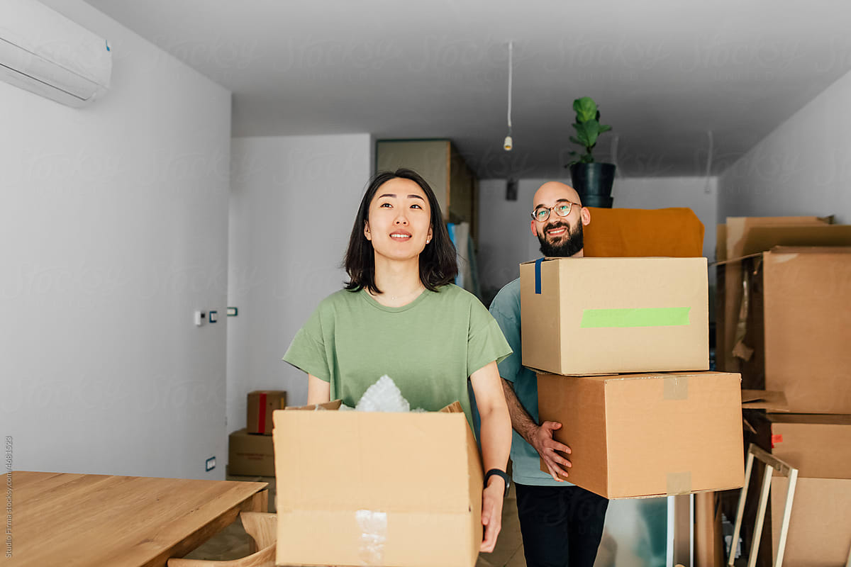 Couple Moving Into New Apartment