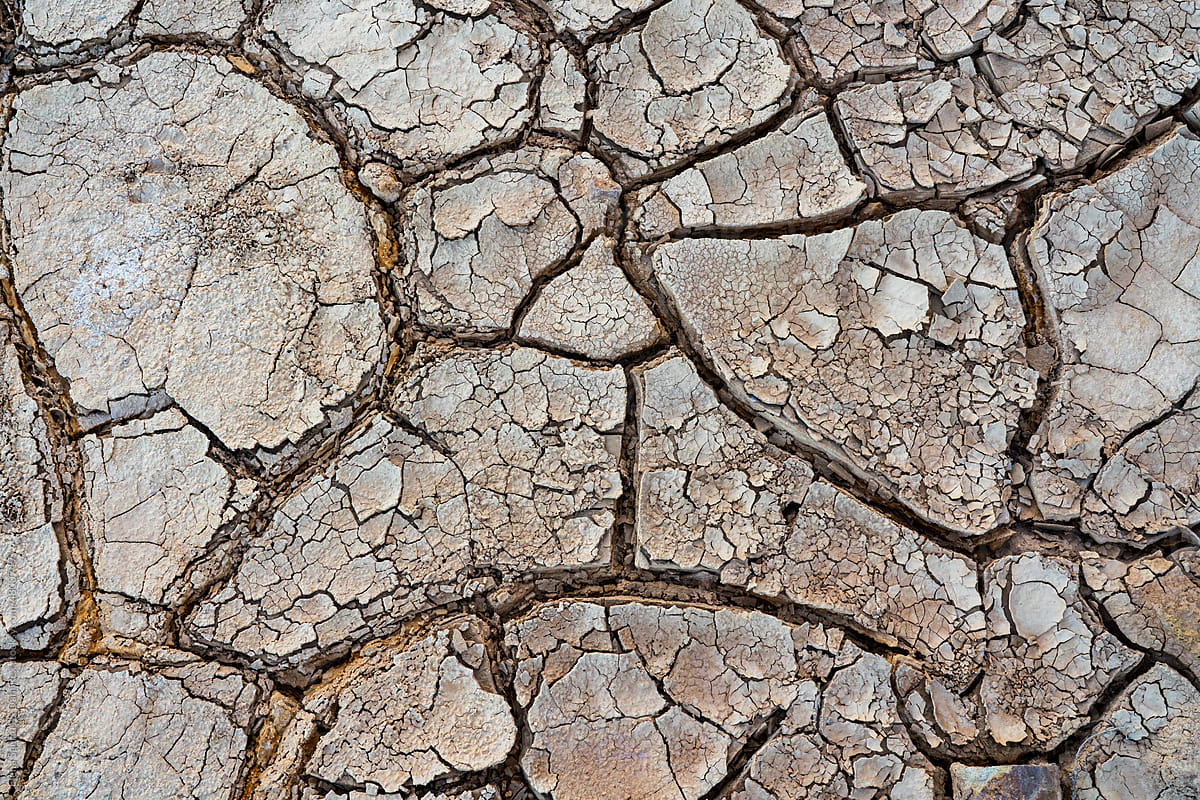 Cracked surface of dry ground textures, top view, abstract background