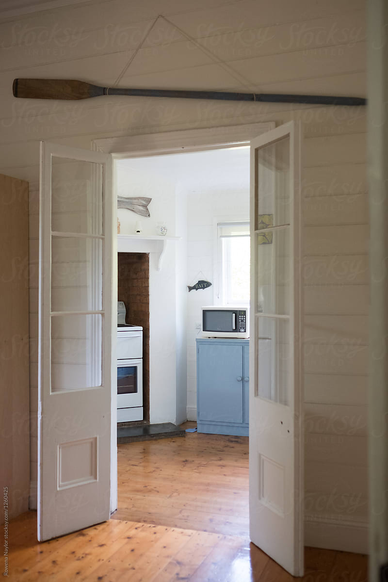 French doors leading to cottage kitchen