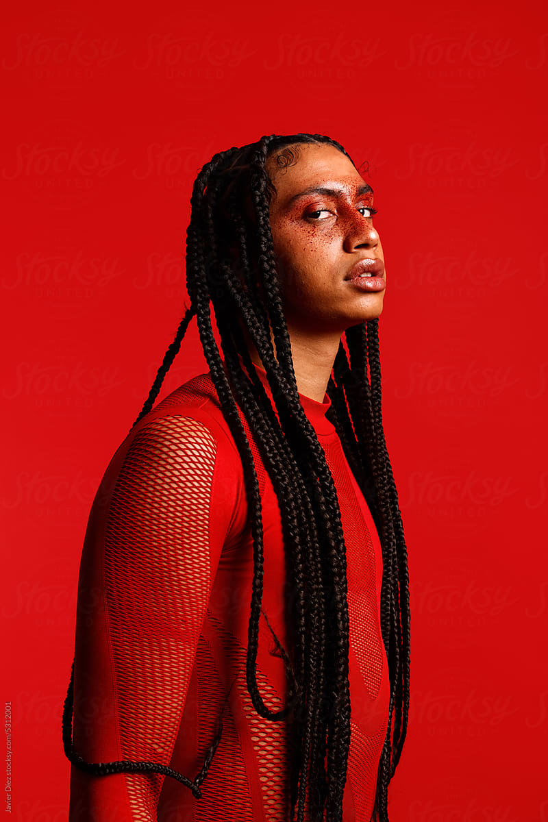 Female model against red background