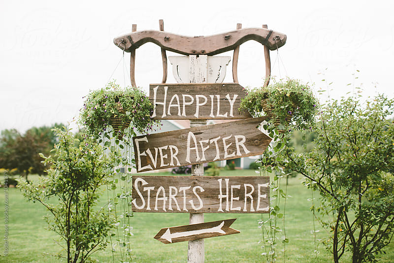 happily ever after wooden sign at wedding