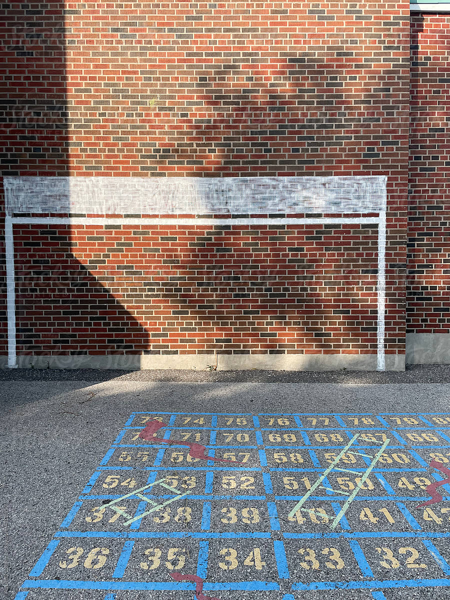 snakes and ladders game at a schoolyard
