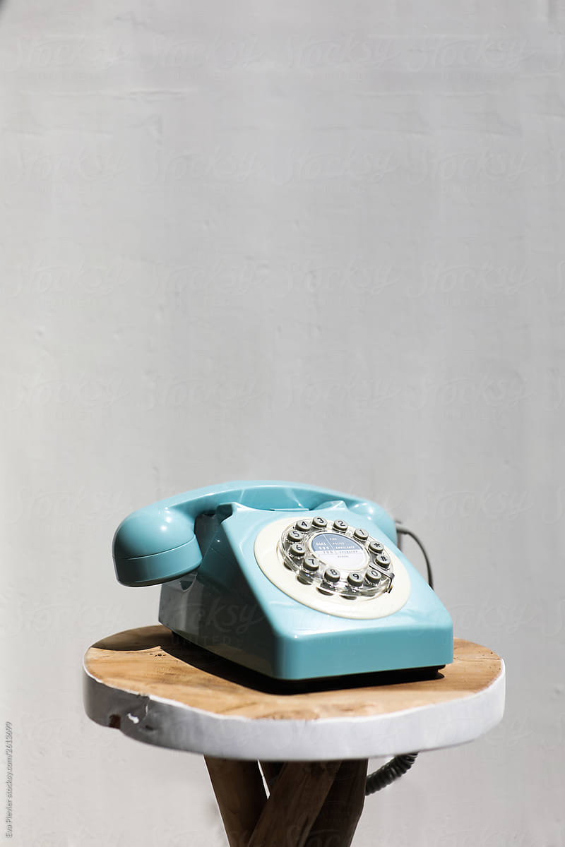 Retro vintage phone on wooden table