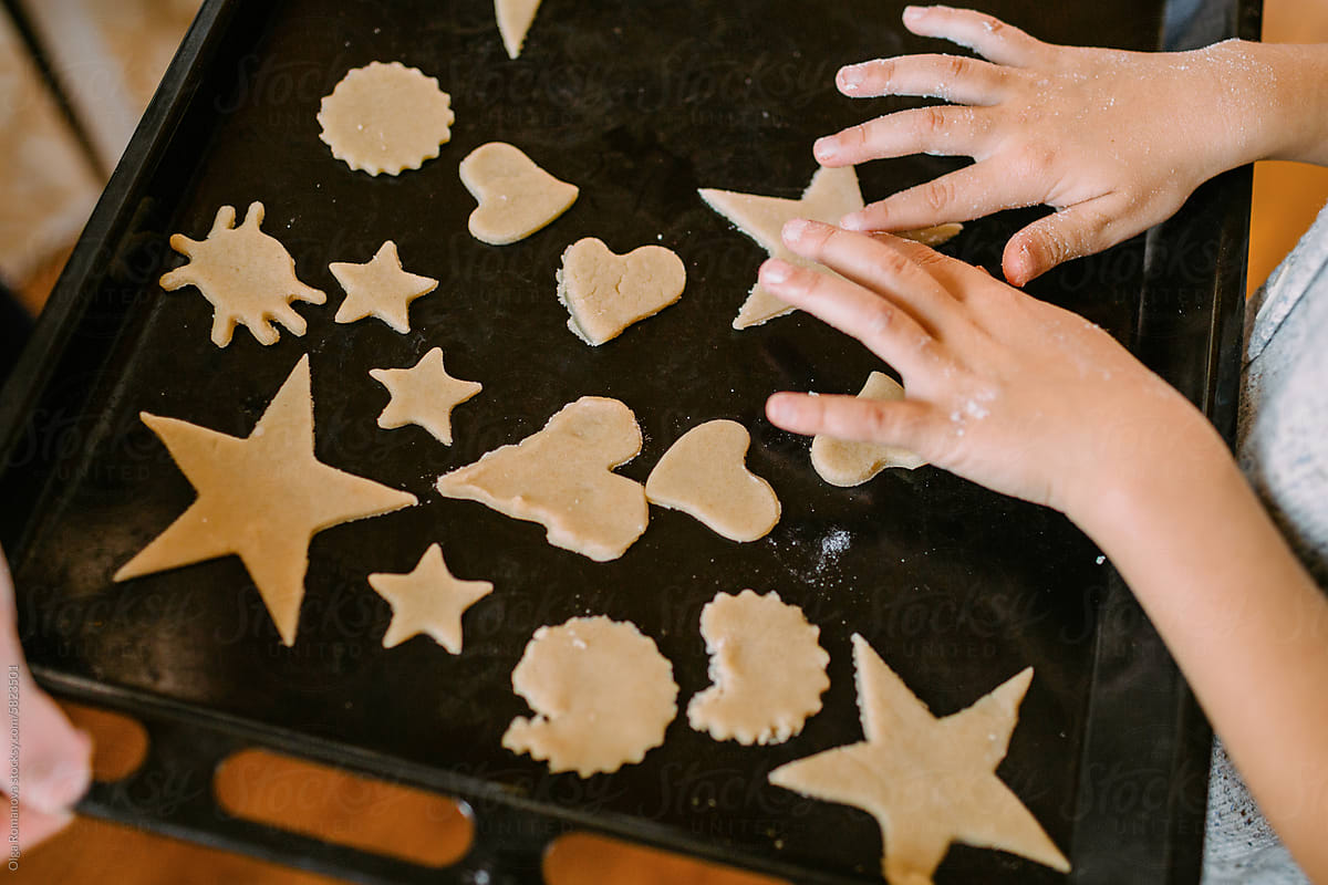 Christmas family cooking, baking the cookies with funny shapes