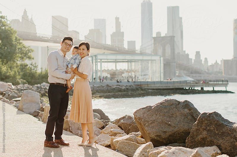 Young Stylish Family in front of Brooklyn Skyline
