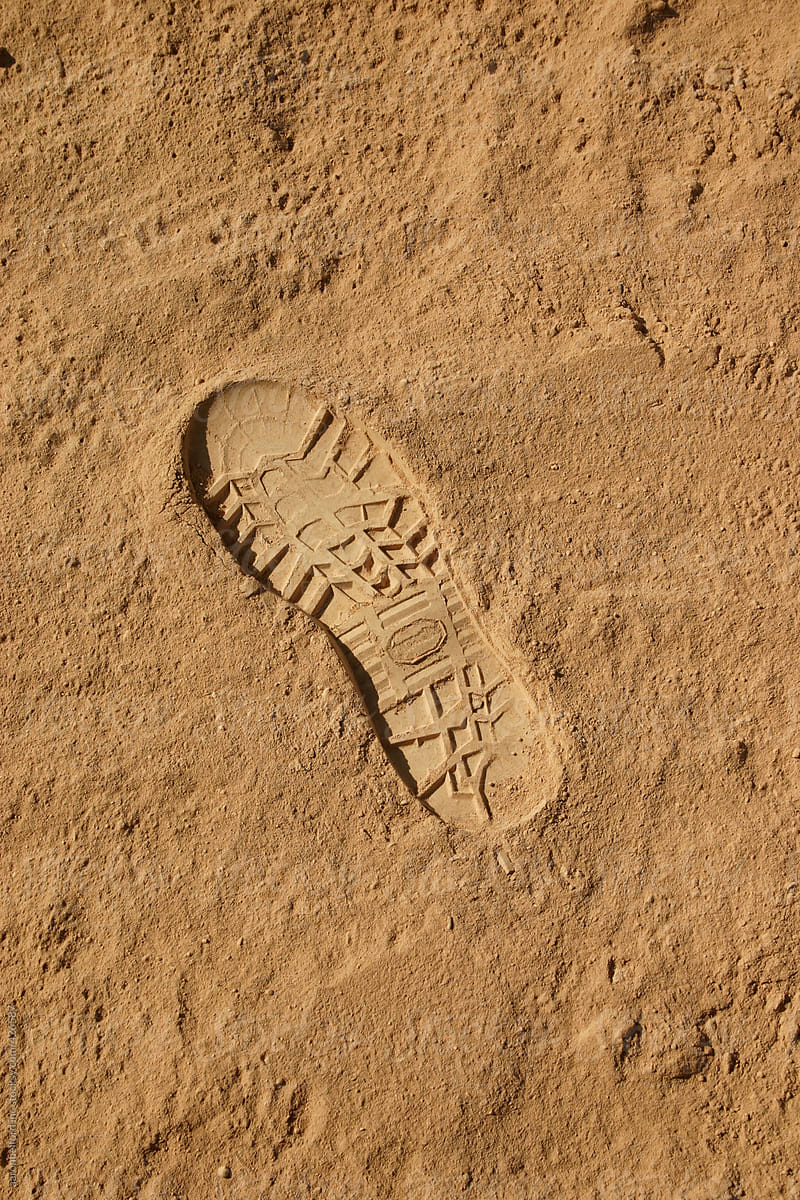 Combat boot foot print in the soft fine sands of Iraq.