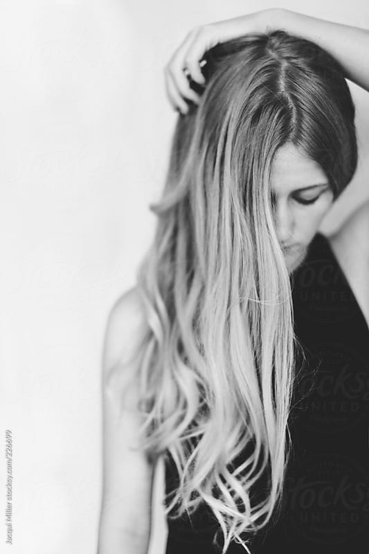 Girl with long  hair  partially covering her face  by Jacqui 