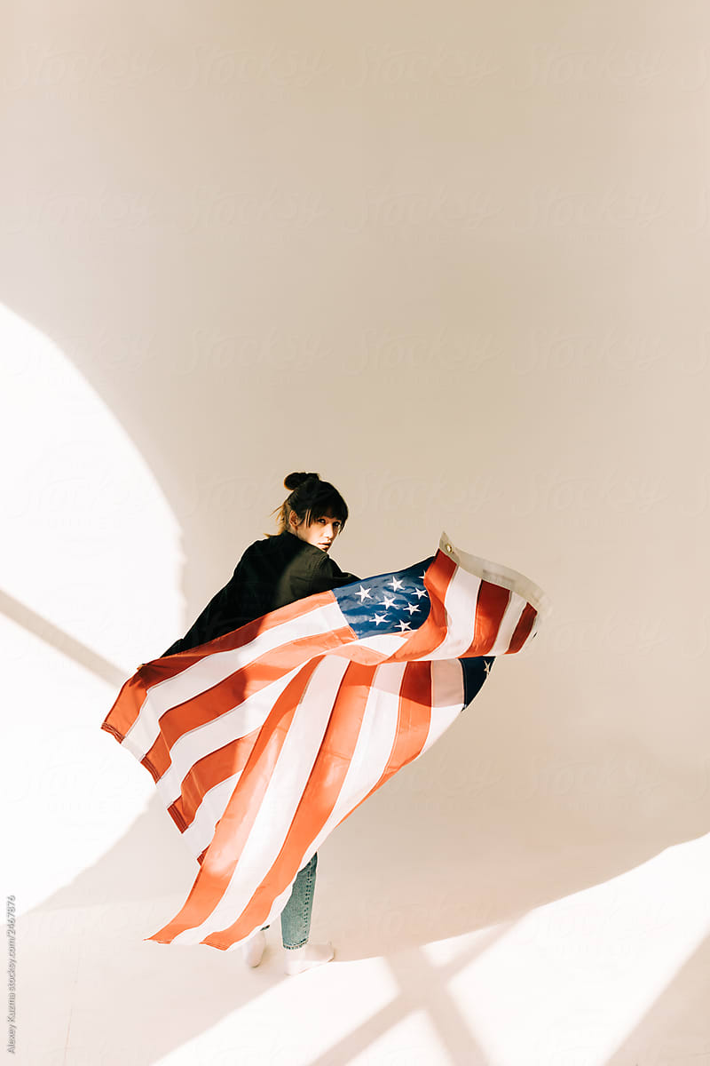 young asian woman with US flag