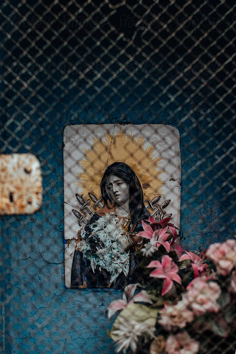 Holy icon and flowers in Tuscany