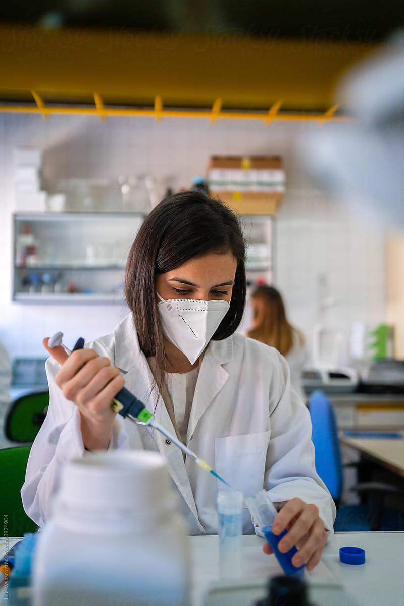Woman Working In A Biology Test In A Laboratory.