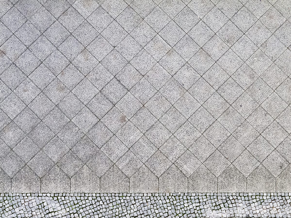 Sidewalk tiles photographed from above