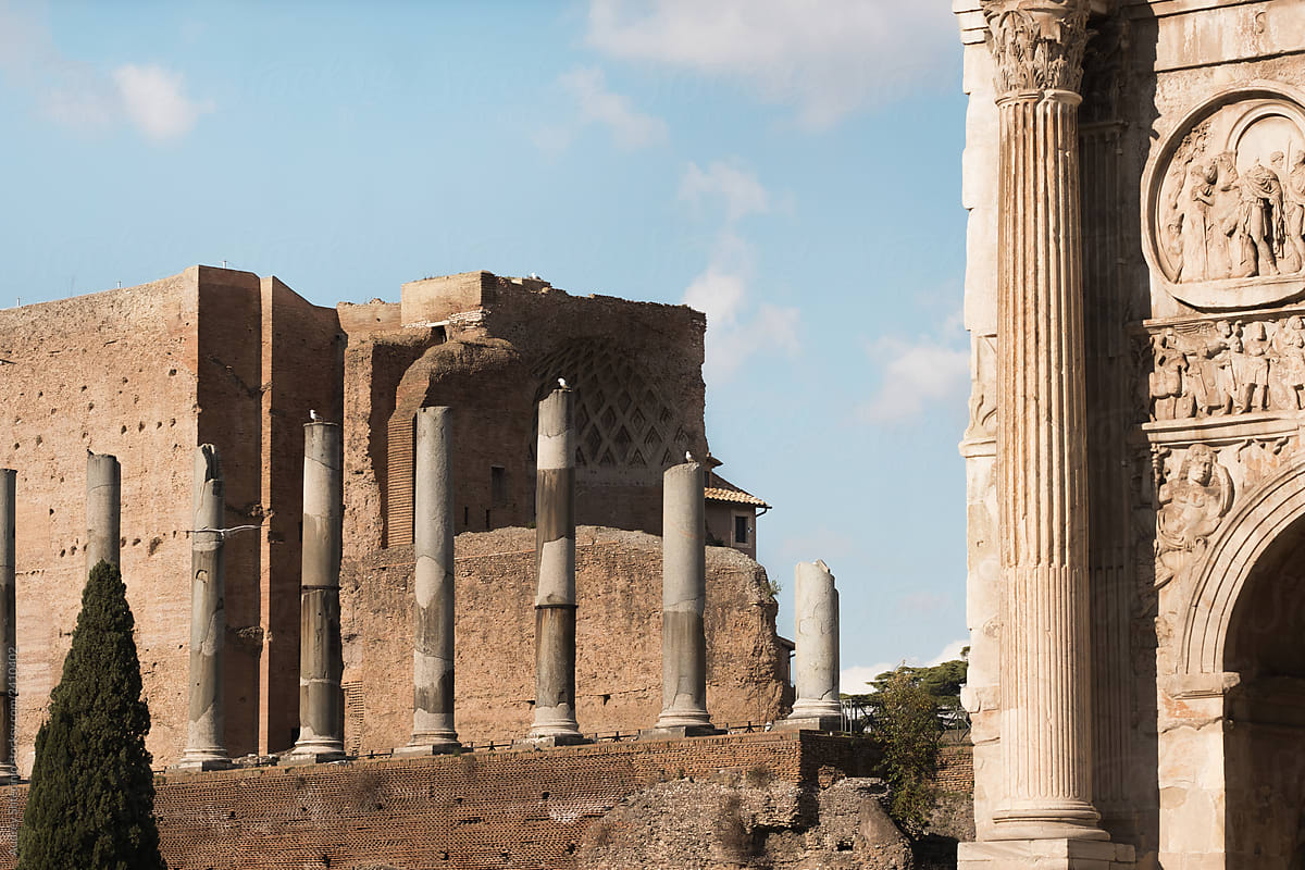 "Trian And Roman Forum / Ancient Ruins In Rome" by Stocksy Contributor "AUDSHULE" Stocksy