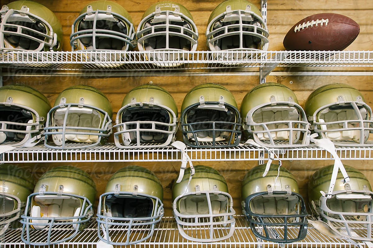 Football Helmets on Shelf and ball