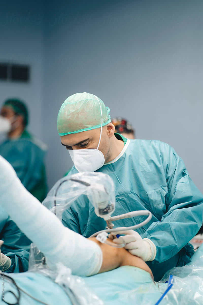 Professional surgeon with equipment at work