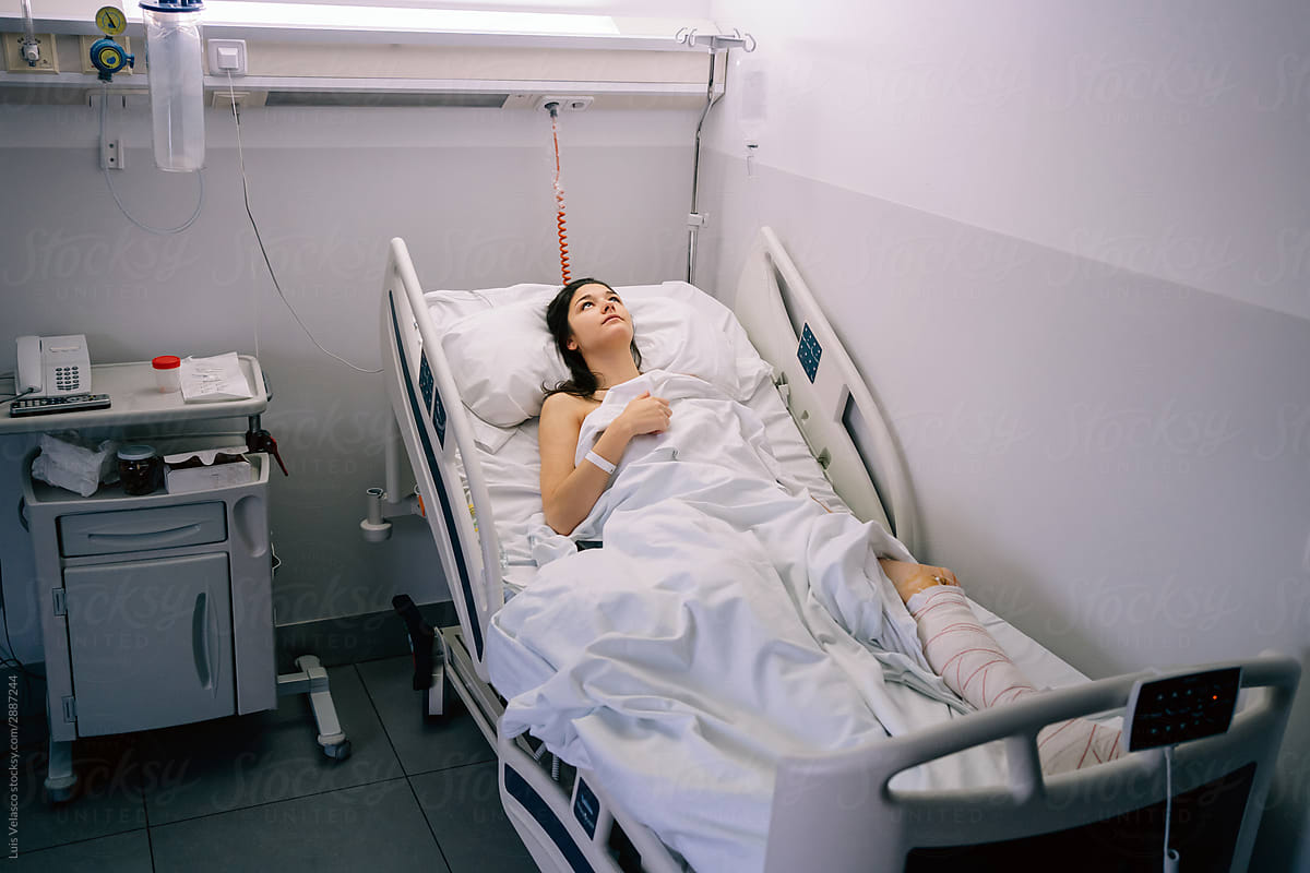 Female Patient In The Bed Of A Hospital.