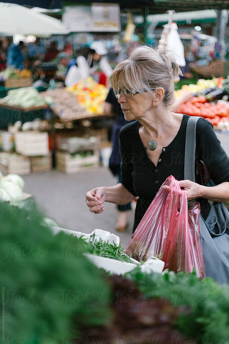 Woman shopping on a green market