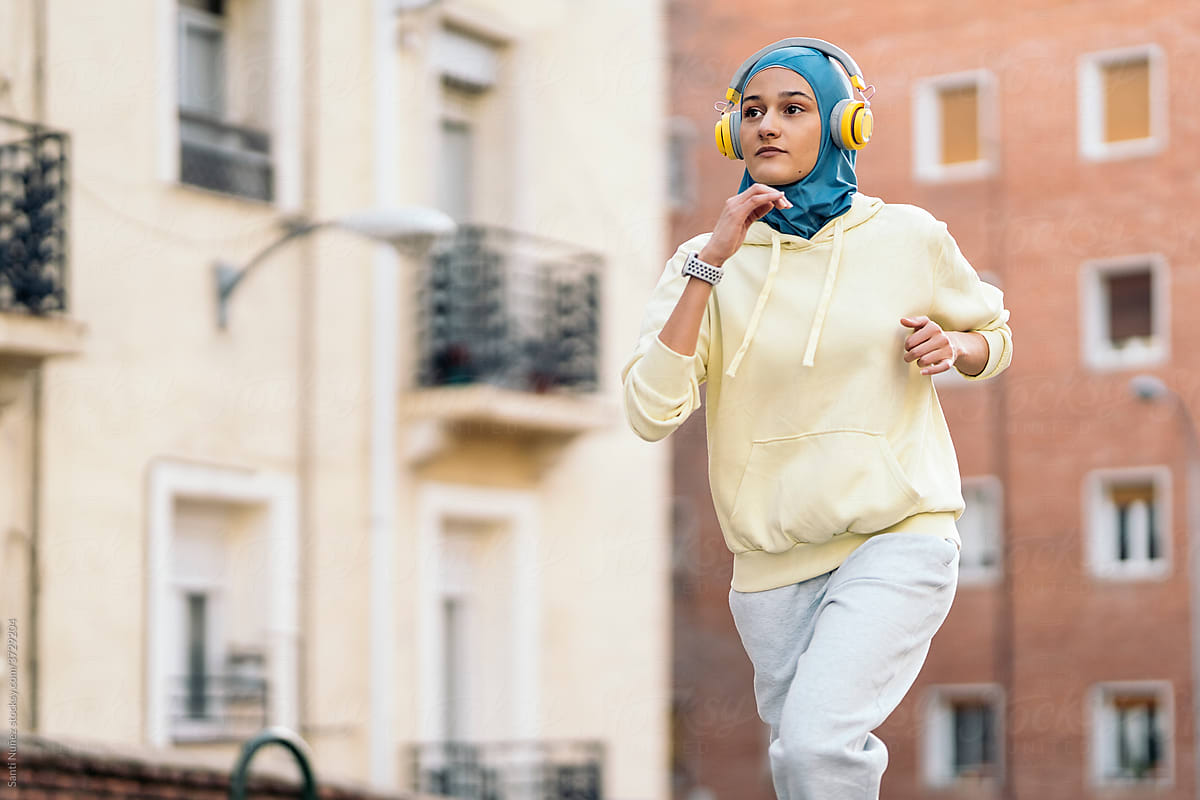 Young Muslim Woman Running
