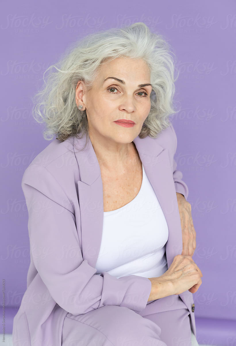 Senior Woman With Silver Long Hair Studio Portrait